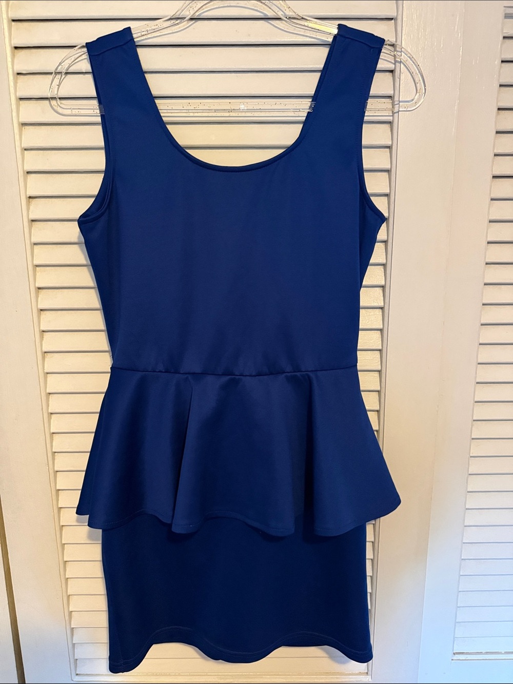Classic Sleeveless Peplum Dress in Navy